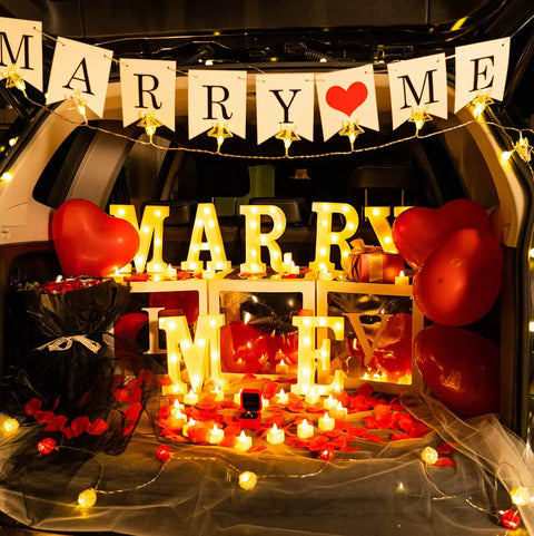 Marry Me Light Up Letters Proposal Kit With 7 Letter Signs 24 LED Tea Lights 2000 Burgundy Rose Petals And 30 Burgundy Balloons