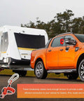 Trailer Brake Away Cable 4Ft High Rebound Towing Coiled Wire With Stainless Steel Carabiner And Pin shown with RV attached to truck