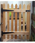 Wooden gate with 2 Inch T Strap Hinges Six Pack Heavy Duty Black Carbon Steel With Screws, installed outdoors, showcasing durability.