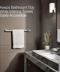 Honesty 24 Inch Towel Bar In Polished Chrome For A Slick Bathroom Upgrade mounted beside a marble sink in a modern bathroom.