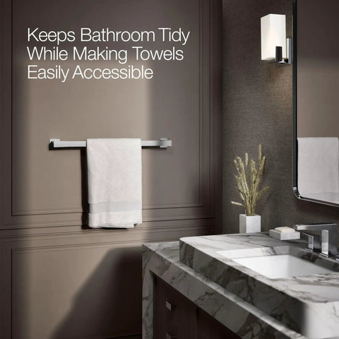 Honesty 24 Inch Towel Bar In Polished Chrome For A Slick Bathroom Upgrade mounted beside a marble sink in a modern bathroom.