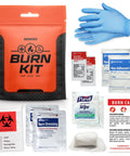 Front view of orange Go2Kits Burn Kit BK33 pouch with blue disposable gloves and burn dressings.