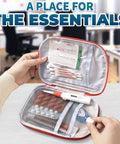Open Two Pack Grab And Go Travel First Aid Bag Set With Zippered Compartments Portable Small Medical Pouch Water Resistant 7.1x5.1 Inch Kit showing contents like cotton swabs and thermometer in an office setting.