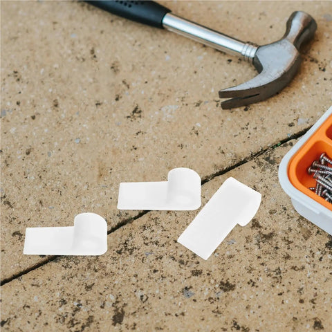 Heavy Duty Sofa Spring Clip Buckles For Oval Sectional Cushions U Shaped Upholstery Clips next to a hammer and screws