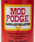 All In One Glue Sealer Finish Clear Gloss For Wood Paper Fabric And More, 32 oz bottle with label in red and yellow.