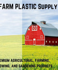 Red barn surrounded by green fields under clear sky, promoting Farm Plastic Supply's agricultural and farming products