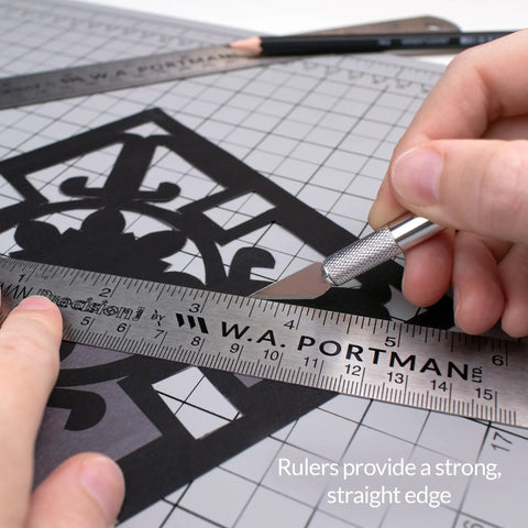 Stainless Steel Ruler Set Three Pack With One 6 Inch And Two 12 Inch Metal Straight Edges used for precise cutting and drawing