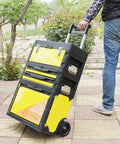 Person pulling On The Go Stackable Toolbox With Rolling Wheels And Comfort Grip Handle, Large Capacity Storage System