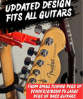 Front view of a Fender Telecaster headstock with a red 3-in-1 guitar string winder tool near the tuning pegs.