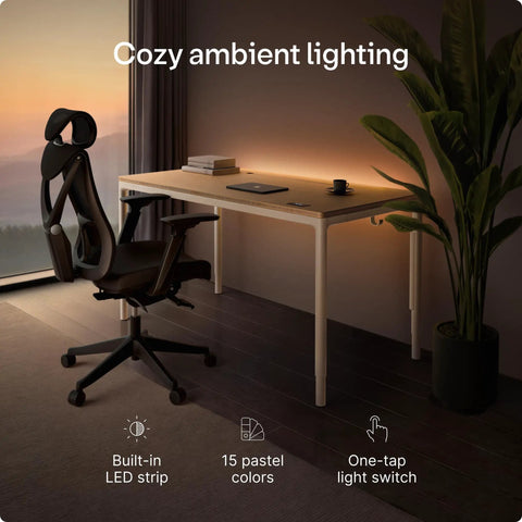 Rock Solid Electric Standing Desk Gliding Smoothly On Ultra Quiet Quad Motors Sixty Three Inch Worktop with LED ambient lighting.