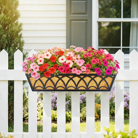 24 Inch Railing Planter Box Set With Adjustable Brackets And Coco Liners 2 Pack Balcony Deck Flower Boxes For Windows And Railings Weatherproof Metal Planters For Outdoor Garden Decor filled with pink and red flowers on white picket fence.
