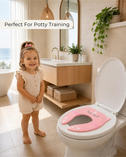 Foldable Travel Potty Seat For Toddlers Featuring A No Pinch Silicone Grip And Slick Non Slip Base Comes With A Pink Unicorn Bag, child using it in a modern bathroom.