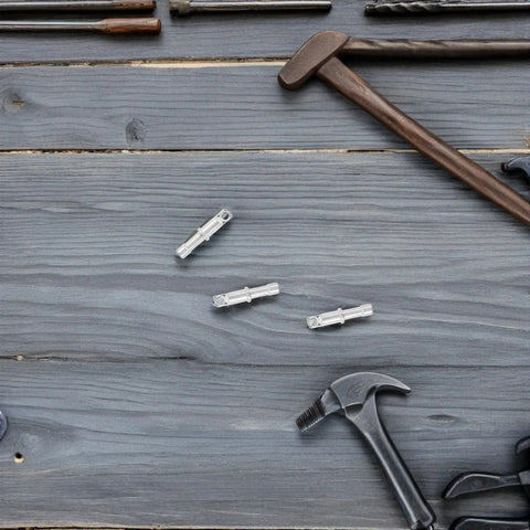 Upgrade Your Camping Gear With These 10pcs Aluminum Alloy Tent Pole End Caps. Heavy Duty Weatherproof Repair Kit Offers Reliable Protection And Versatile Compatibility For Any Outdoor Adventure Or Stormy Scenario You Face Today.. silver tent pole end caps on wood surface
