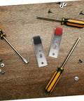 Smooth Ride Heavy Duty Sliding Door Roller Wheels For Wooden Barn Doors with mounting brackets and screwdrivers on wood.