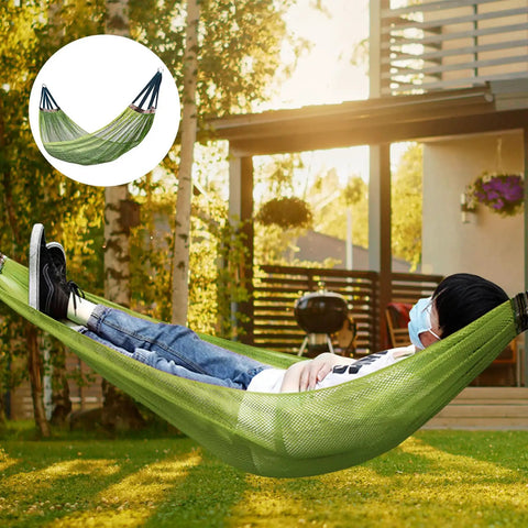 Ultra Durable Camping Hammock With Mesh Net For Outdoor Adventures Portable Hanging Bed, green hammock with person relaxing