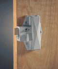 Pushbutton Deadbolt Satin Chrome Mechanical Lock With Thumb Turn Entry on wooden door, side view