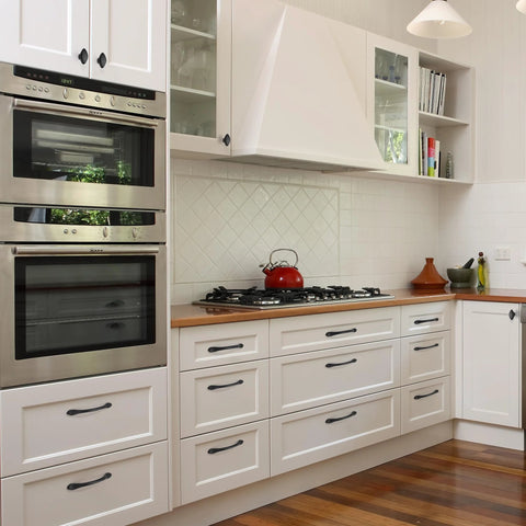 Modern kitchen with white cabinets featuring Six Pack Matte Black Cabinet Pulls 7.5 Inch Hole Center Cabinet Handles for renovation.