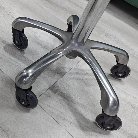 Heavy Duty Office Chair Caster Wheels Set Of Five For A Killer Smooth Ride On Hardwood Tile And Carpet Universal Rollerblade Rubber Casters For Gaming Desk Swivel Chairs Quiet Gliding No Fuss Setup Three Inches, showcasing rollerblade wheels under a silver office chair base.