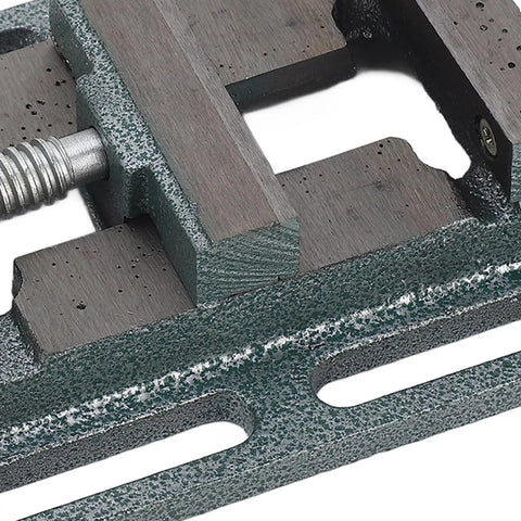 Close-up of Beefy 3 Inch High Carbon Steel Drill Press Vise with raised widened jaws for precise woodworking and hardware projects.