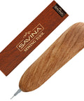Ergonomic Wooden Needle Threader For Hand Sewing With Hardwood Handle And Stainless Steel Hook For No Fuss Easy Threading 1 Cm Extended Tip That Fits Small Eye Needles And Sewing Machines Savina next to a branded box.