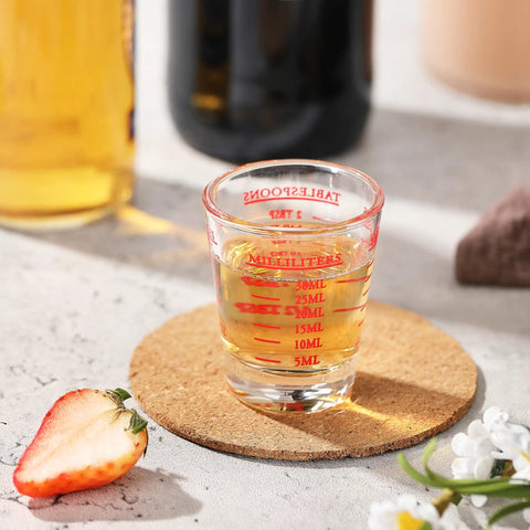 Two Pack Shot Glass Measuring Cup Set With Thick Base, Multi Unit Liquid Measuring Cup For Espresso And Drinks, Four Measuring Scales Include 1 OZ, 2 TBS, 6 TSP, 30 ML For Precise Pouring on table