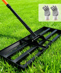 Heavy Duty Lawn Leveling Rake With 30 By 10 Inch Plate And 78 Inch Adjustable Handle on grass, includes gloves for protection.