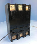 Top Dollar 600 Amp Three Pole Molded Case Circuit Breaker, heavy-duty black unit, designed for industrial electrical systems.