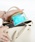 Everyday Mini First Aid Kit For Women And Moms, Compact Purse Emergency Kit With 27 Essentials being placed in a handbag