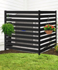 Black outdoor AC unit fence screen set, 3 panels, 42 inch tall by 38 inch wide privacy fence concealing equipment in garden corner.