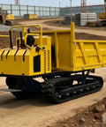 Heavy Duty Mini Crawler Dumper Featuring Rock Solid Hydraulic Dump Bed, compact yellow tracked vehicle on construction site.