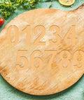 Premium Acrylic Letter And Number Router Templates Pack Of Six Hella Durable Woodcarving Stencils With Punctuation Marks Totally Legit For Any Diy Project Or Custom Engraving Job Measuring Roughly 7By2 Inches on wooden board with visible numbers.