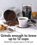 Fresh Grind Electric Coffee Grinder with beans and coffee cup, stainless steel blades, removable grinding chamber, black color.