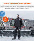 Man in black winter workwear in snow beside plow, Tough As Nails Heavy Duty Insulated Bib Overalls For Winter Workwear Black Size Small