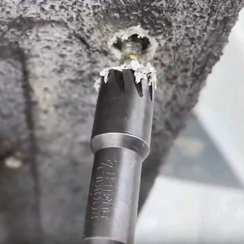 Pookie Buster Magnetic Nut Driver Set with patented broach cutter in action removing material from hex screw head