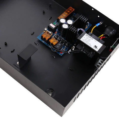 Inside view of the Heavy Duty Access Control Power Supply Box with circuit board, fuses, and connections for Wiegand systems.