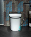 Slick Smart Toilet With 1.28 Gpf Dual Flush And Auto Open Close Lid Driven By Foot Sensor 1000g Map Flush Rating visible in modern bathroom.