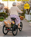Powerful 1000W Peak Electric Trike For Adults Folding 20-Inch Three-Wheel E-Trike With Step-Through Frame Removable 624Wh Battery Large Basket Black Cruiser Pro For City Streets And Light Trails, rear view on road