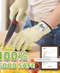 Person wearing Ultra Durable ANSI Cut Resistant Gloves With 10X Reinforced Food Grade Safety, slicing celery in kitchen, size M