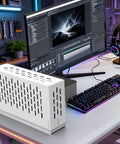 Built Legit External Egpu Dock Pcie Four Point Zero Thunderbolt Enclosure For Gaming Laptops, sleek white design on desk with monitor.