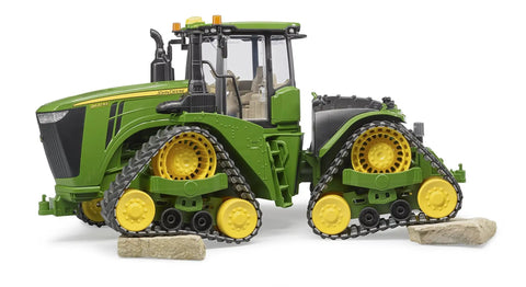 John Deere 9620RX Track Belts Tractor Toy Realistic 1 To 16 Scale German Made ABS Plastic Farm Vehicle on rocky surface