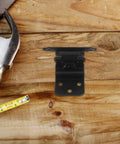 Auto Close Spring Loaded Cabinet Door Hinge 3/8 Inch Self-Closing Soft Close Hardware in black on wooden surface