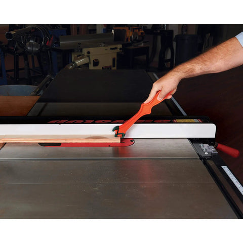 Get A Grip TPR Push Stick With Reversible Notches And Bright Orange Grip guiding wood on table saw