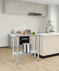 Built Tough Stainless Steel Commercial Work Table 14x30 Inches With Undershelf And 2 Inch Backsplash Heavy Duty NSF 430 Kitchen Prep Station For Restaurants And Food Service in modern kitchen setting.
