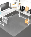 Clear Office Chair Mat For Carpeted Floors 63x51 Inches under a desk, protecting low-pile carpet in a home office setting.