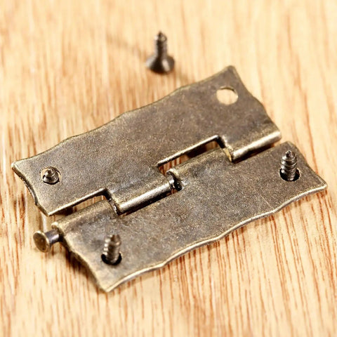 Close-up of 2 Pack Cabinet Door Hinges 36x23mm Wooden Box Decorative Hinges With Screws And Storage Box on wood surface