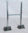 Front view of saddle support rooftop pipe stand with metal frame and speckled bases