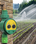 Green Automatic Sprinkler Timer With Rain Delay And Manual Watering, Smart Garden Irrigation Controller in use on brick wall