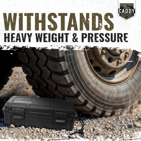 Rugged Waterproof Case With Airtight Gasket Seal And Foam Interior under large vehicle tire on rocky terrain