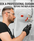 Water heater pilot assembly being installed; side view of technician wearing safety goggles and gloves by gas valve