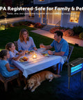 Family dining outdoors with Dual Powered Mosquito Zapper With 4500V Electric Grid USB Recharge Auto On Off IPX5 Waterproof.